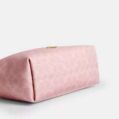 C*ACH - Laurel Shoulder Bag In Signature Canvas With Charms - Gold/Powder Pink