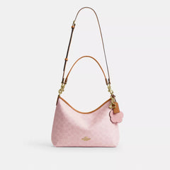 C*ACH - Laurel Shoulder Bag In Signature Canvas With Charms - Gold/Powder Pink