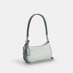 C*ACH - Ter* Mini Crossbody Bag In Signature Canvas - Silver/Chalk/Blue