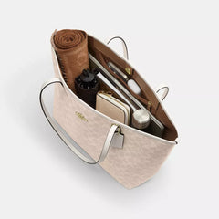 C*ACH - City Tote Bag In Signature Canvas - Gold/Sand/Chalk