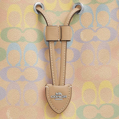 C*ACH - Rowa* Bucket Bag In Rainbow Signature Canvas - Silver/Sand Multi