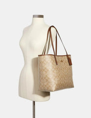 C*ACH - City Tote Bag In Signature Canvas - Signature Brown