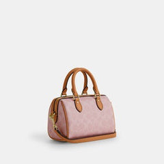 C*ACH - Mini Rowan Crossbody Bag In Signature Canvas - Pink