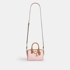 C*ACH - Mini Rowan Crossbody Bag In Signature Canvas - Pink